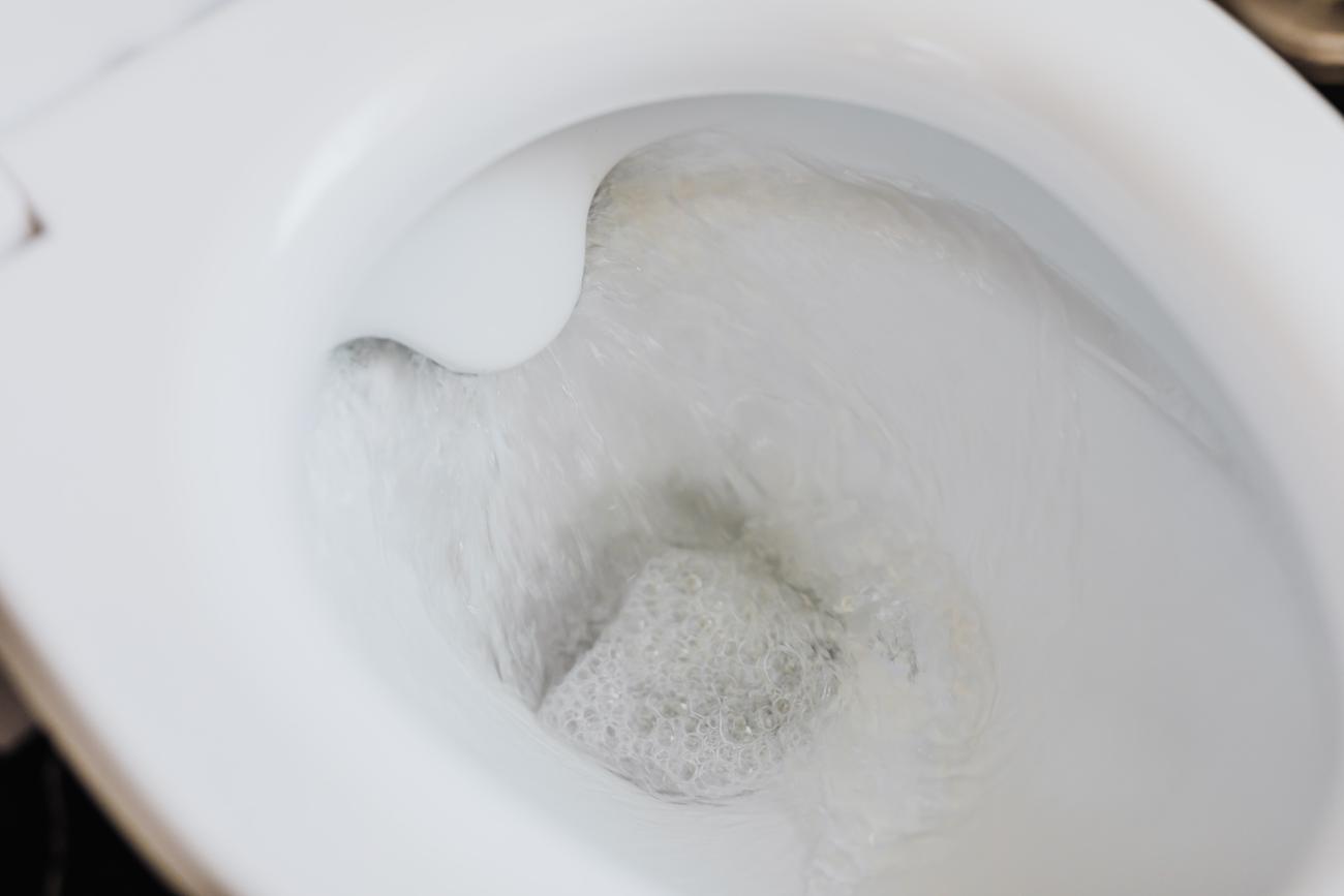 water flushing in a toilet bowl